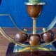 Pair of Art Deco candlesticks in brass and varnished wood, 1930s/1940s