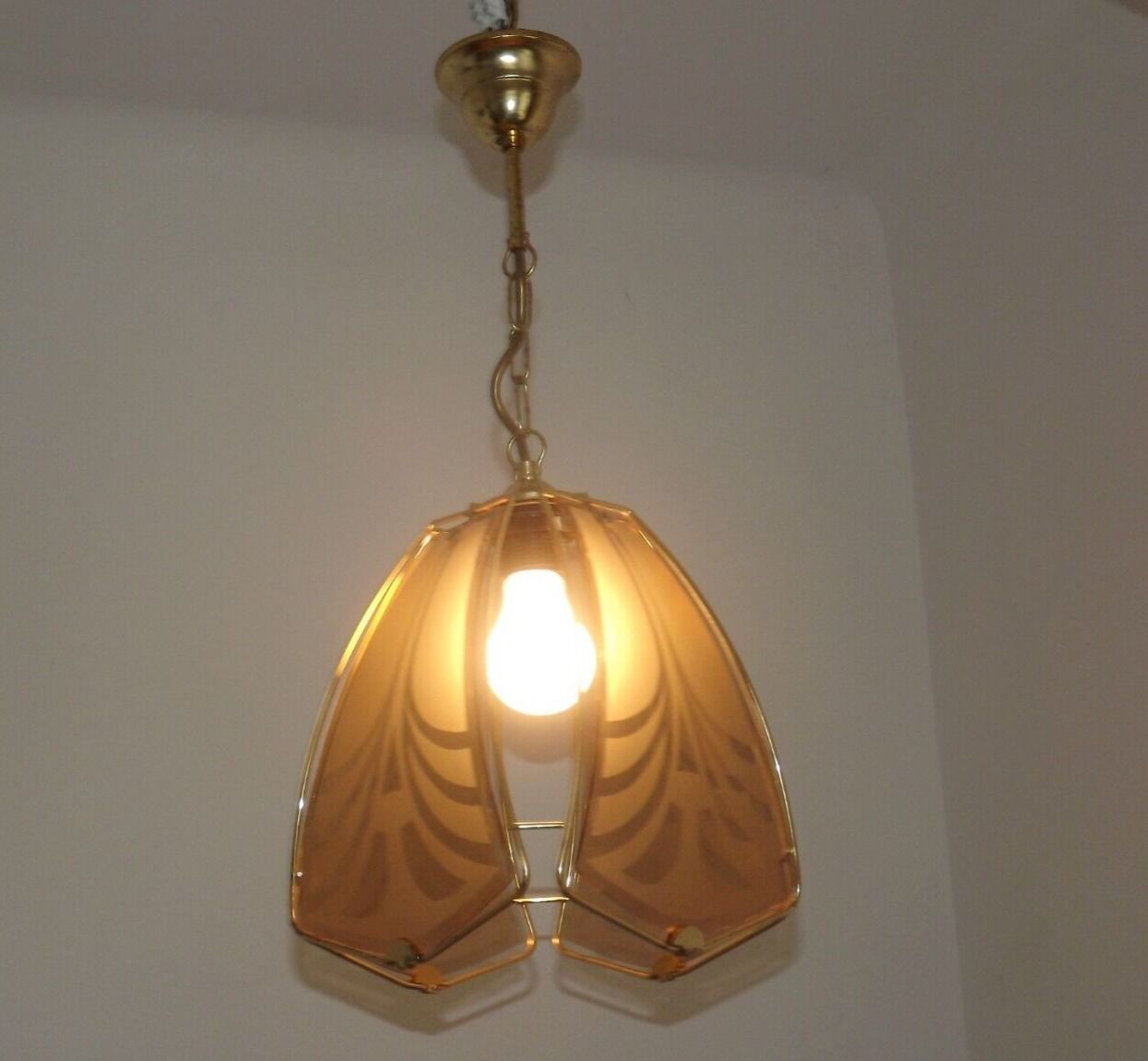 French ceiling light in gold metal with 4 decorative glass panels.