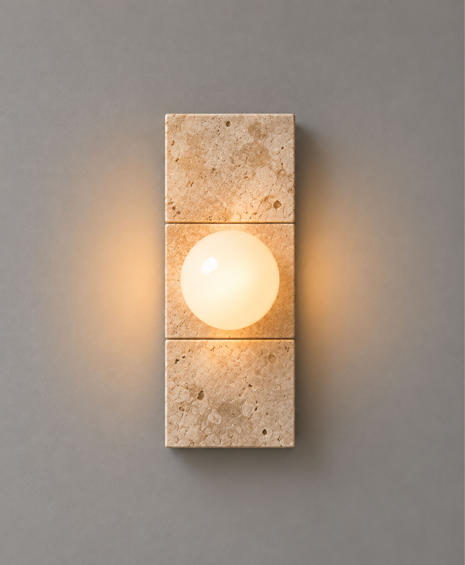 Wall light in travertine