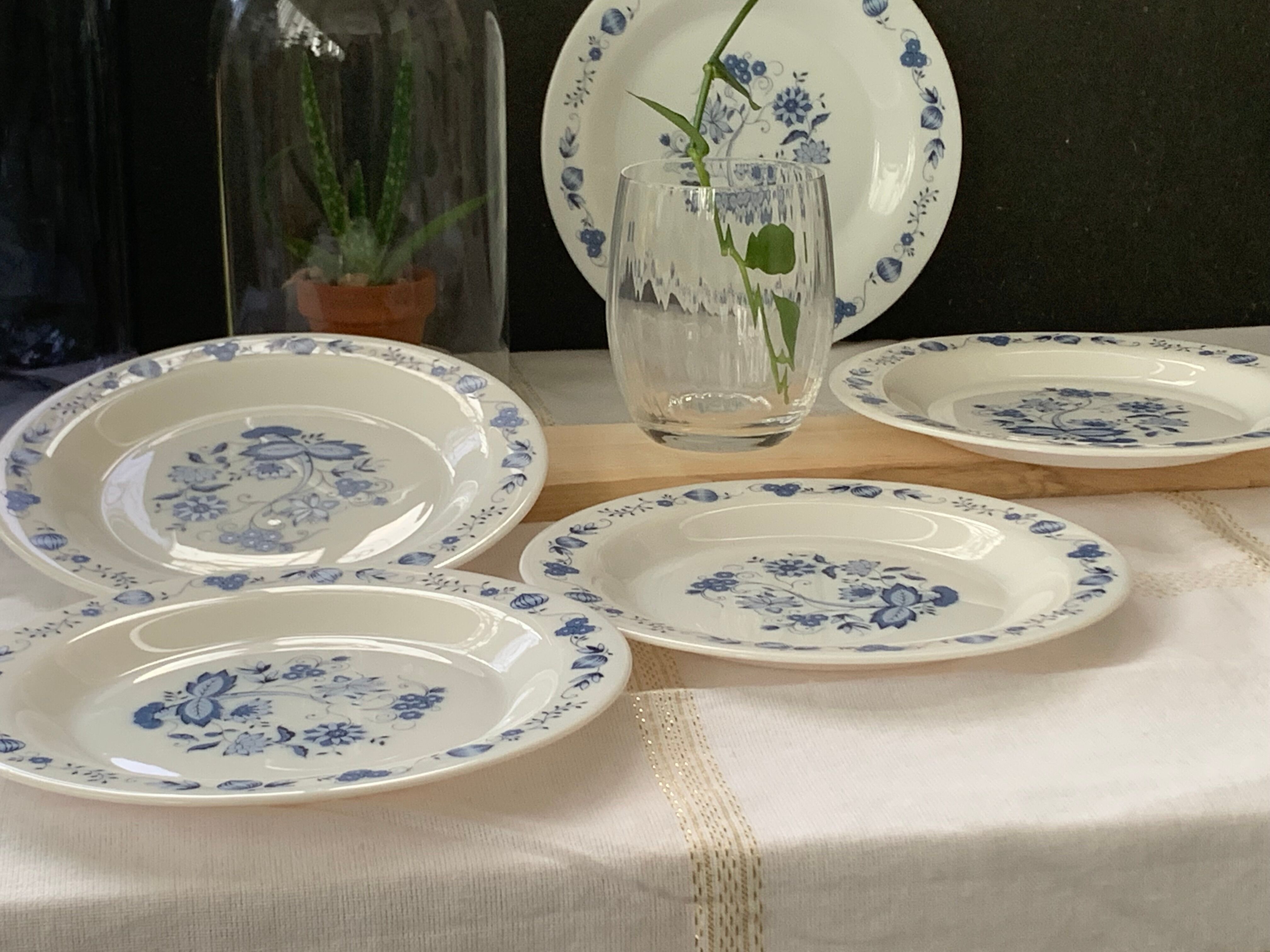 3 bowls and 5 blue plates