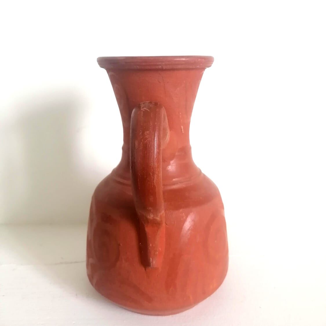 Pitcher in oriental terracotta