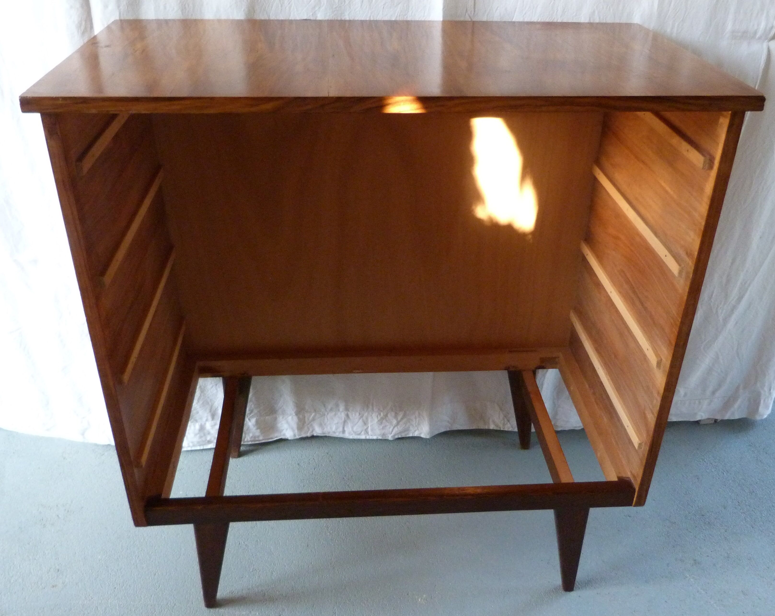 Compass feet chest of drawers