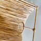 Raffia wall lamp
