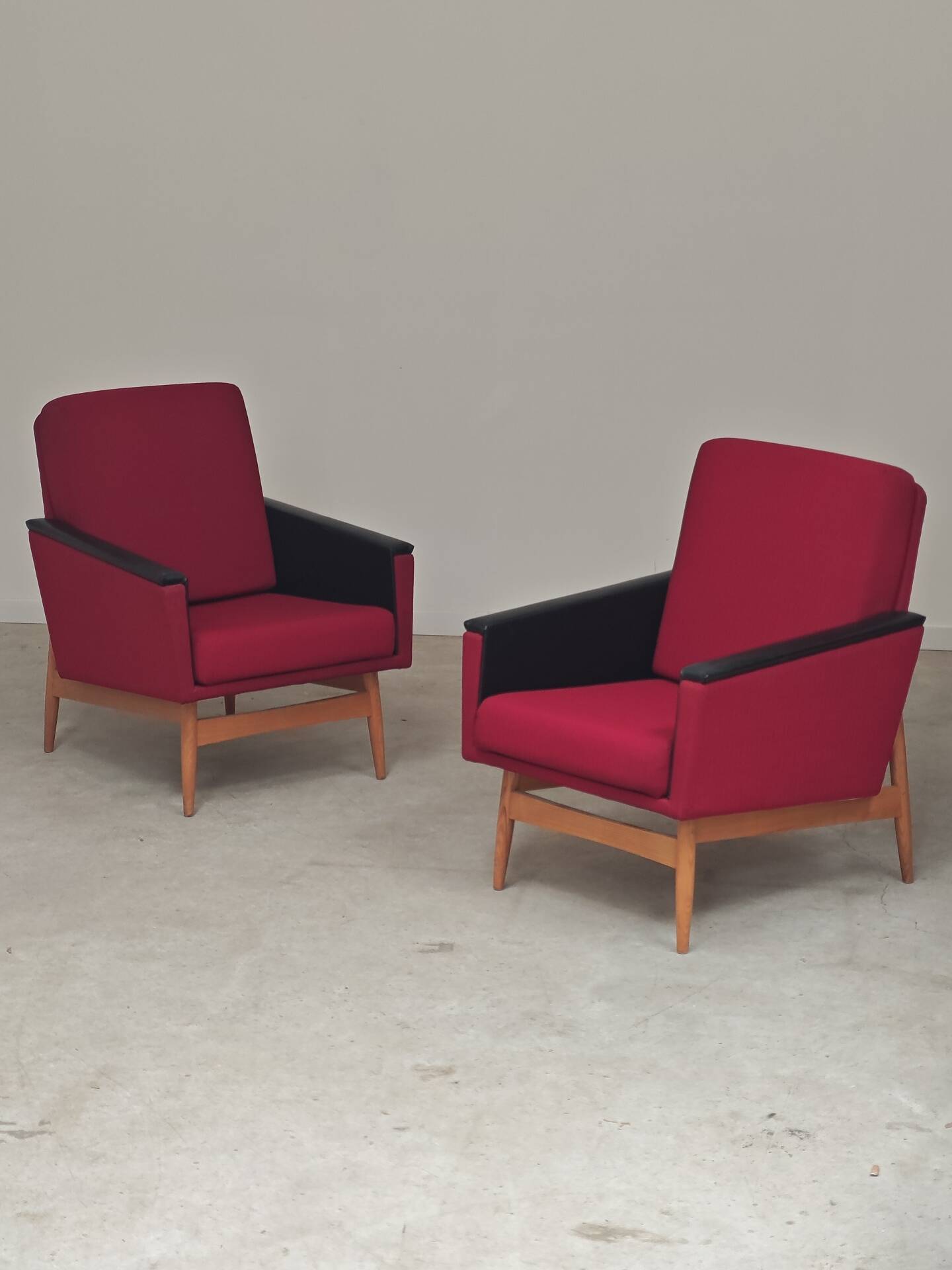 Pair of Drevotex Zamberk armchairs, red fabric and faux leather 1970