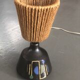 Brutalist style laying lamp with rope lampshade and ceramic foot