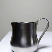 Set of 4 vintage bar measures in brushed stainless steel from the 60s-70s.