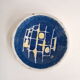 Small cup in white and blue vintage ceramic with yellow motis.