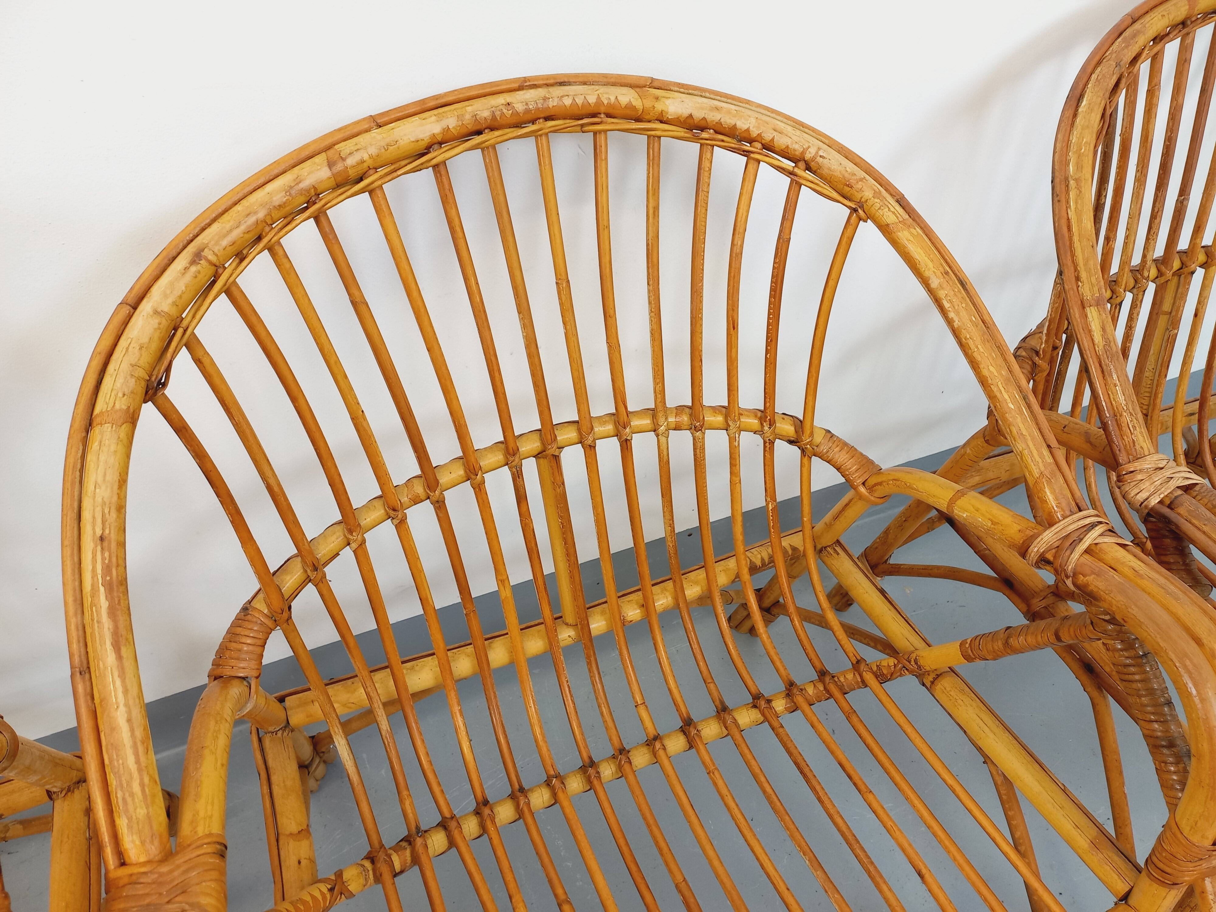Set of 4 vintage rattan armchairs from the 60s