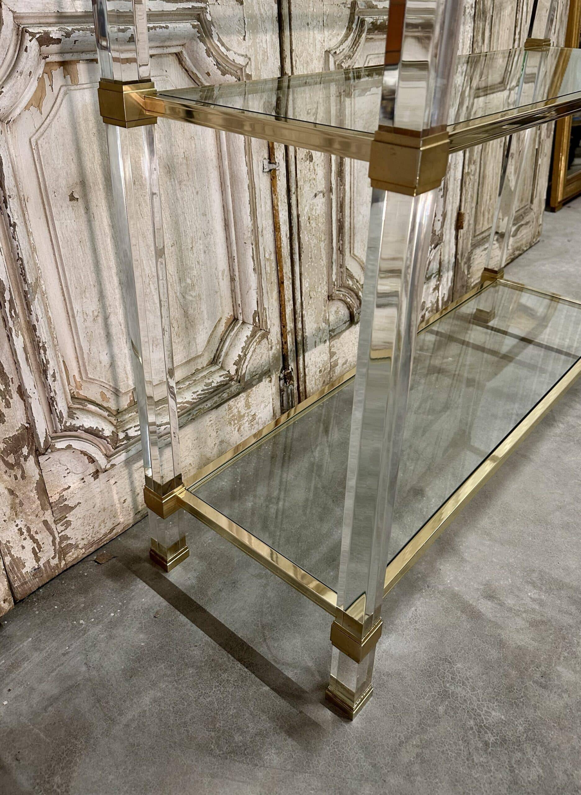 Plexiglass shelf by Pierre Vandel in Hollywood Regency style circa 1970.