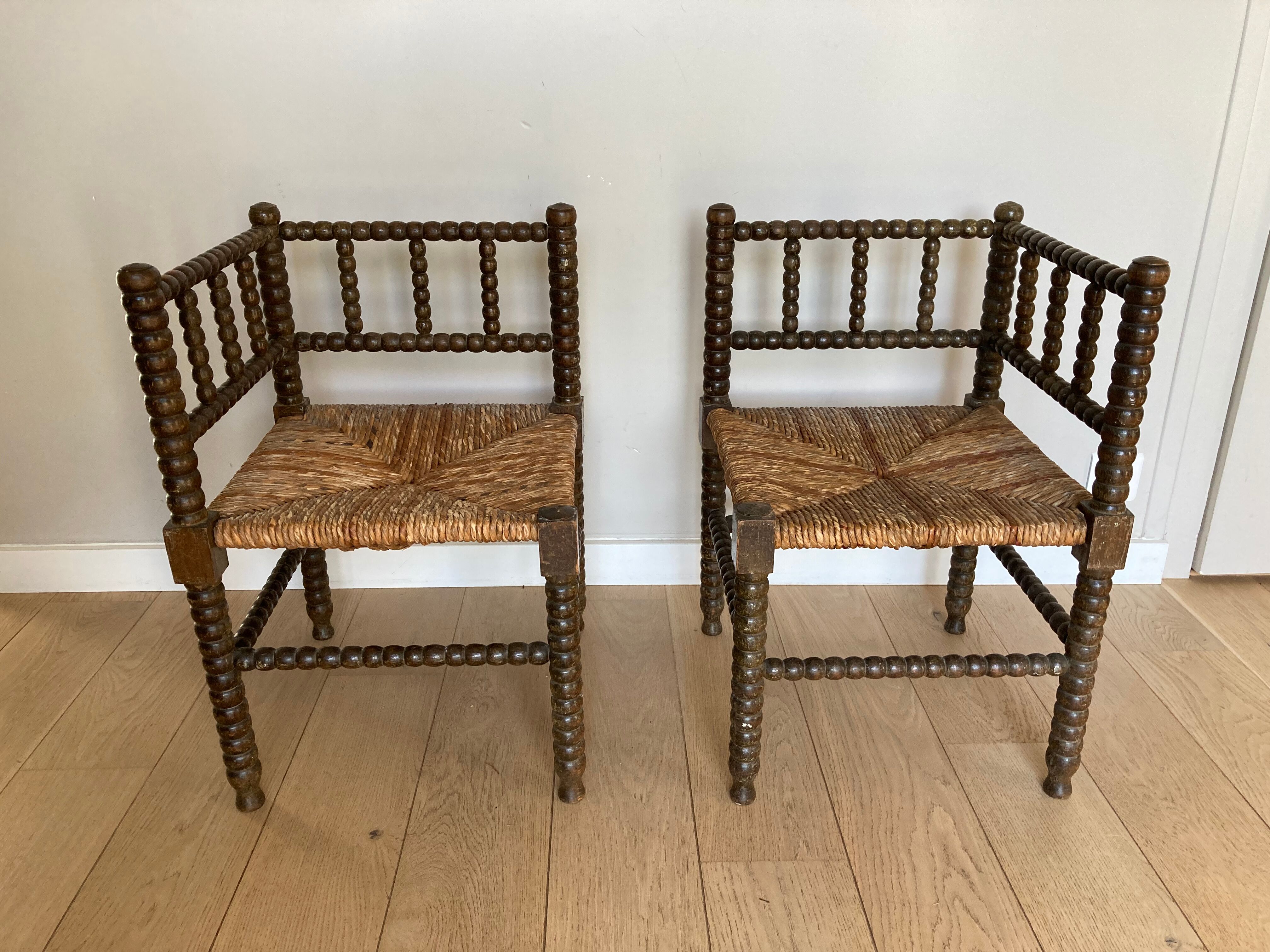 Turned wood corner armchairs