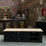 Workshop furniture transformed into a TV unit.