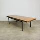 1950s modernist coffee table, wood and black metal.