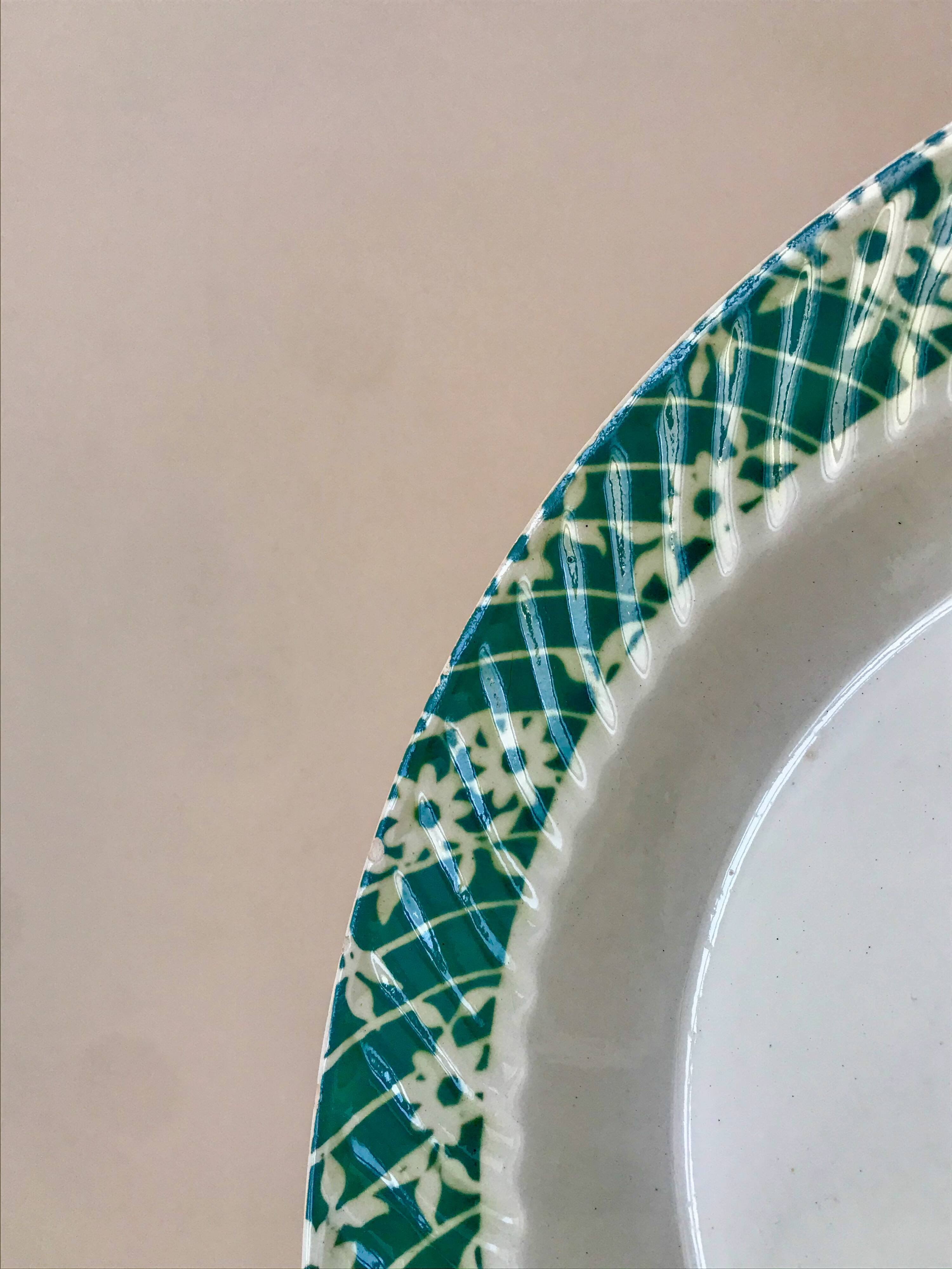 St Amand hollow dish textured white flowers on a green background, 1950s