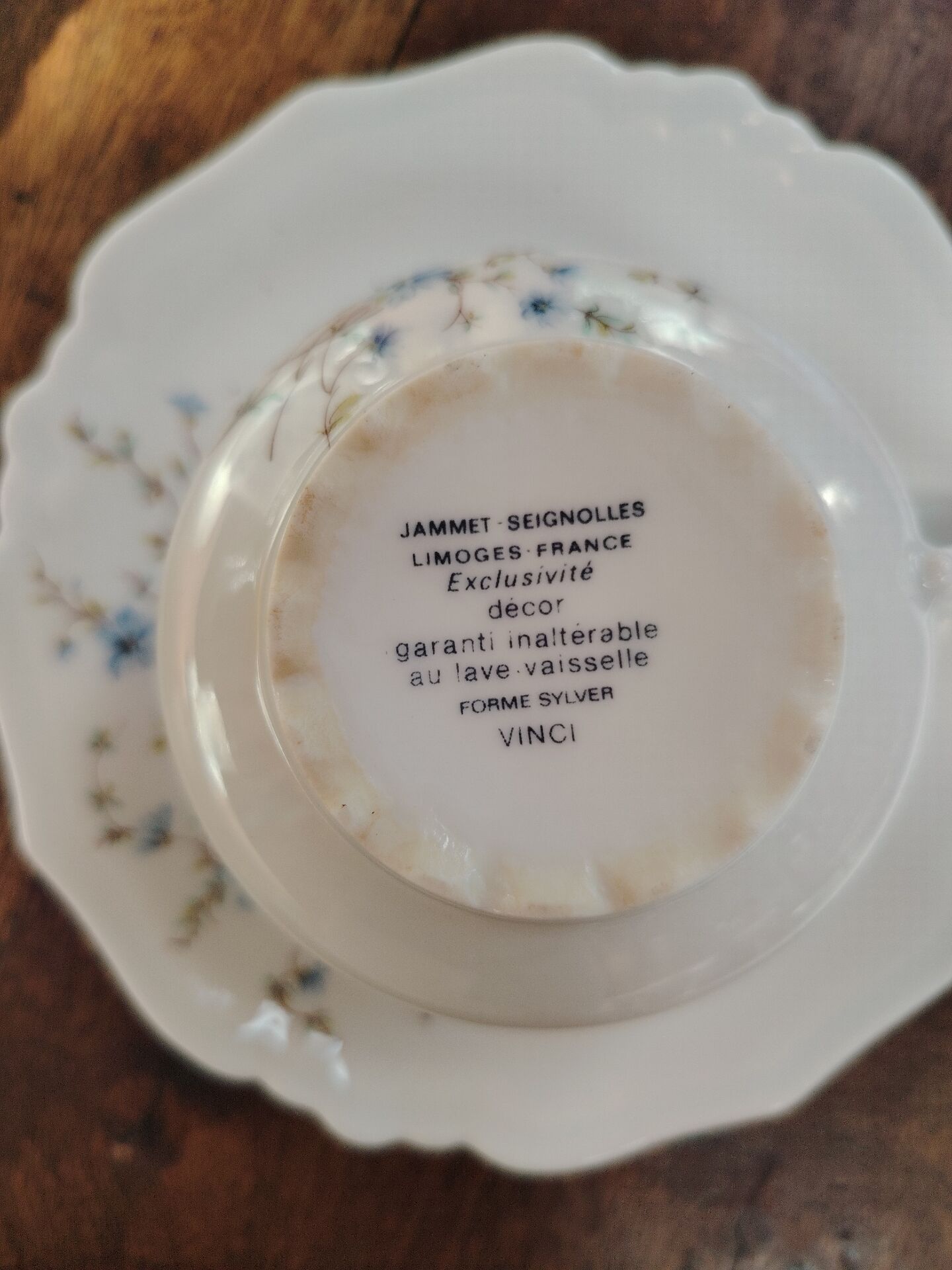 Set of 4 Limoges porcelain cups and saucers.