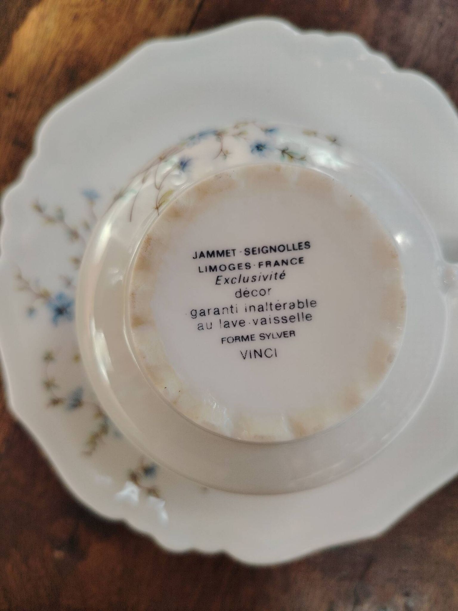 Set of 4 Limoges porcelain cups and saucers.