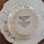 Set of 4 Limoges porcelain cups and saucers.