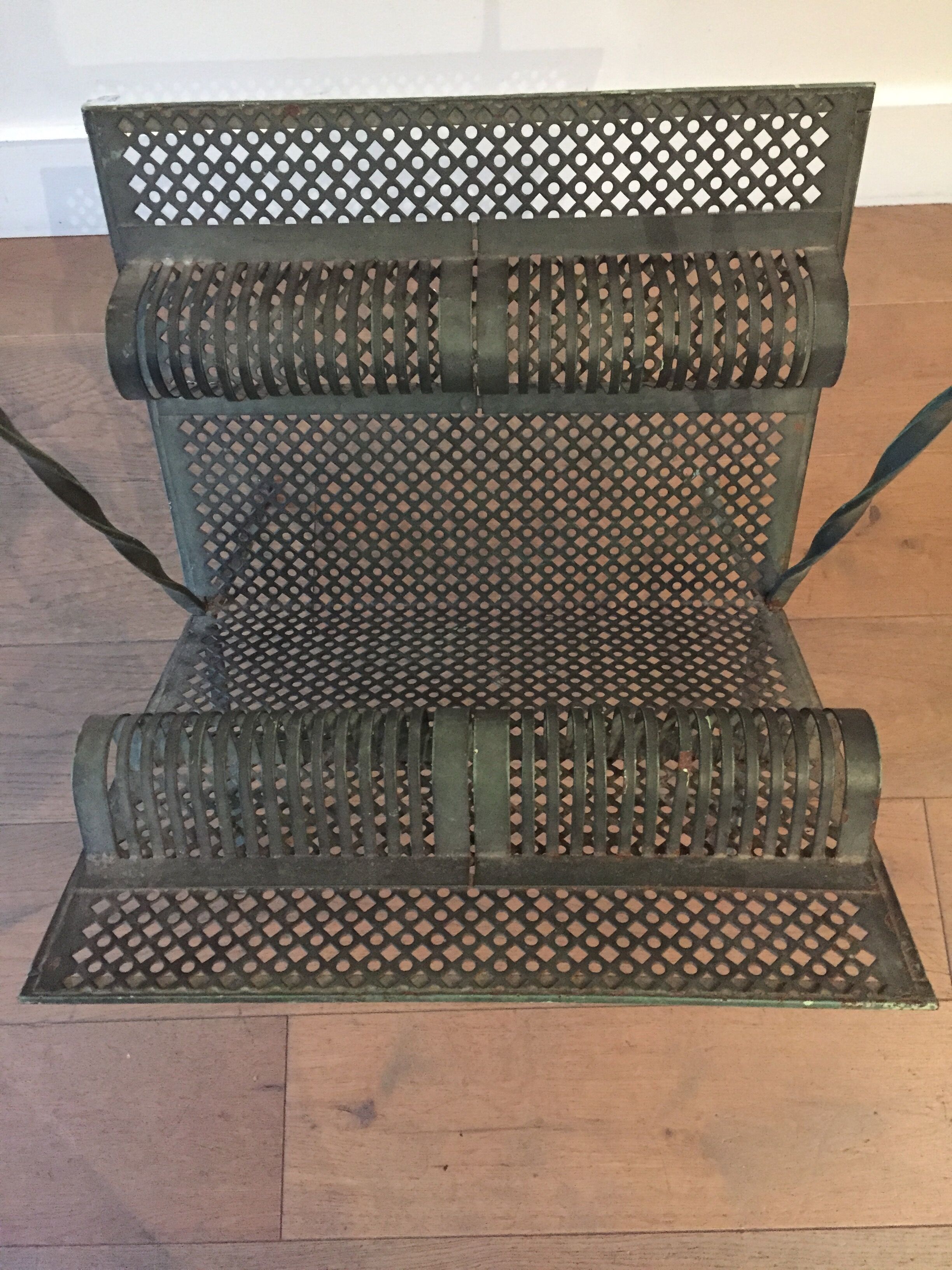 Perforated metal magazine rack 1950