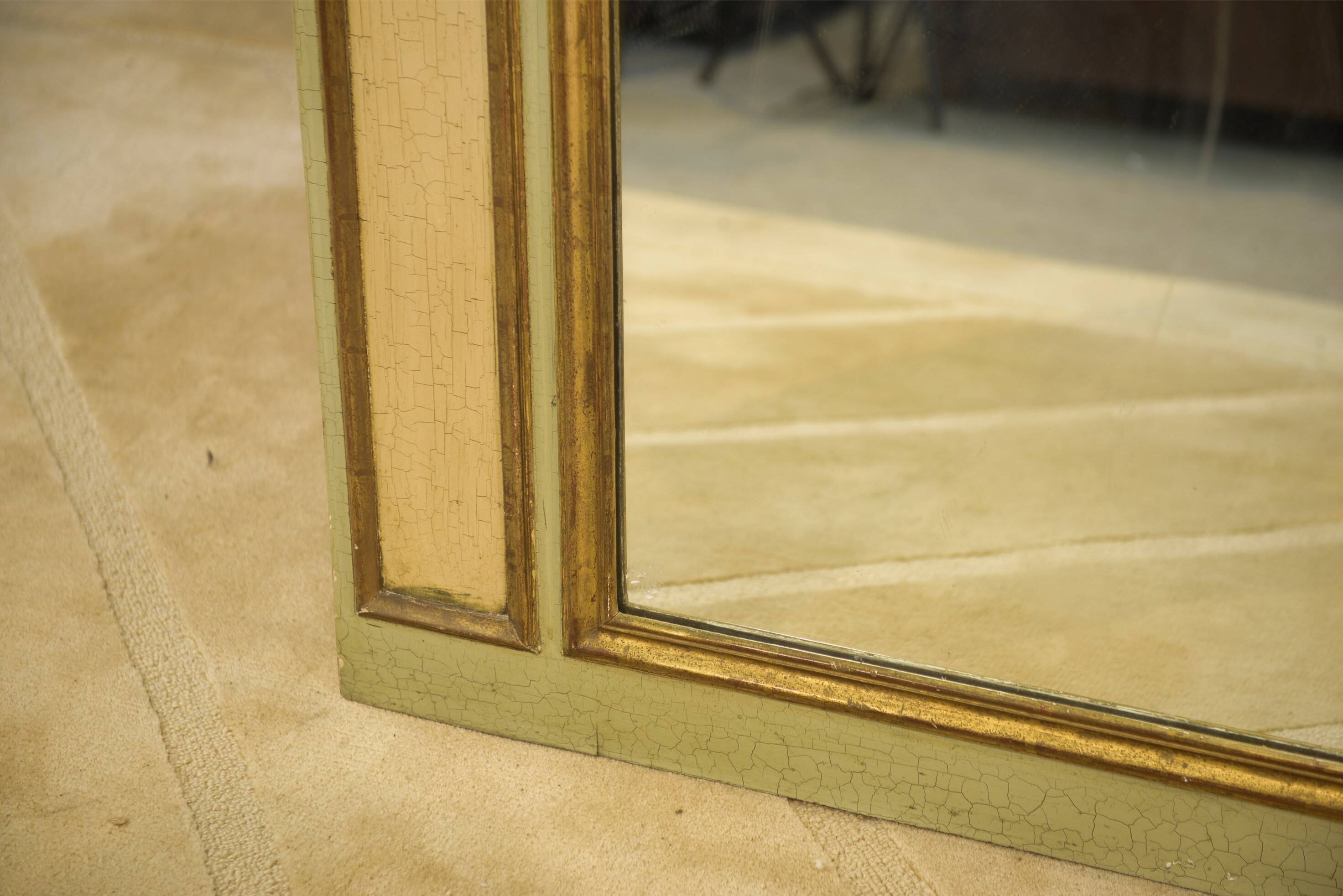 Trumeau mirror with cracked patina and oil on panel depicting a romantic scene from the 19th century.