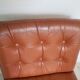 Vintage armchair in brown leather