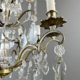 Bronze, brass and crystal chandelier, early 20th century.