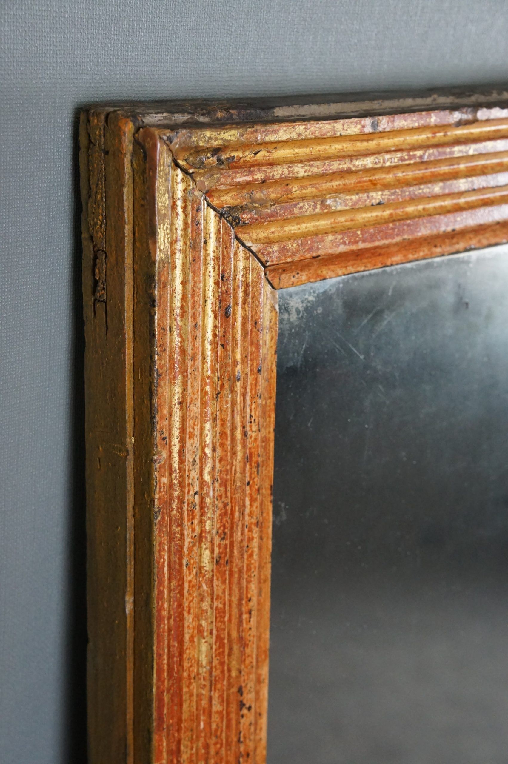 Patinated golden fireplace mirror eighteenth century 123 x 91.5 cm