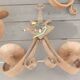 Four antique wrought iron wall lights