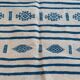 Traditional handmade white and blue kilim rug in natural wool