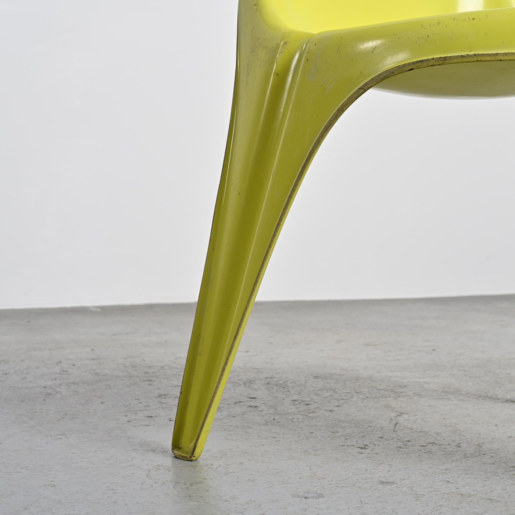 Pair of yellow fiberglass tripod chairs by Walter Frey, circa 1968