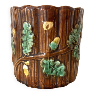 Antique slip pot with acorn decoration