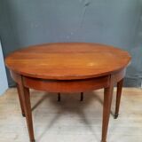 Half moon table with 3 elongations