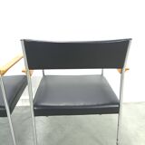 Chaises DDR avec base chromée et revêtement noir, chaises de salle à manger