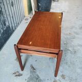 Vintage coffee table with Scandinavian rise and fall system in teak