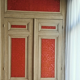 Closet front with double molded doors in patinated wood XX century