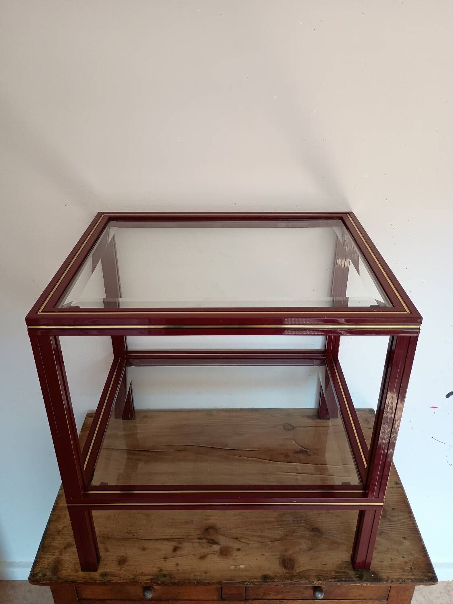 Side table in glass and brass