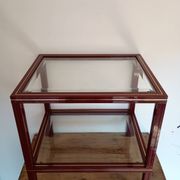 Side table in glass and brass