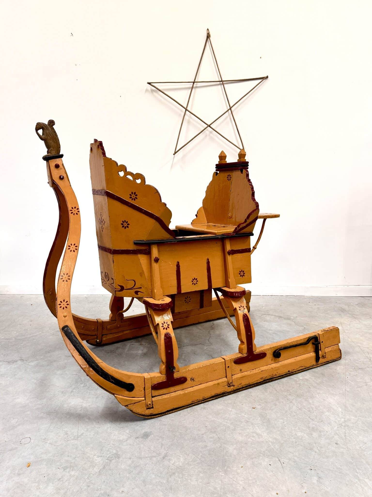 Old wooden sleigh – called "Troika"