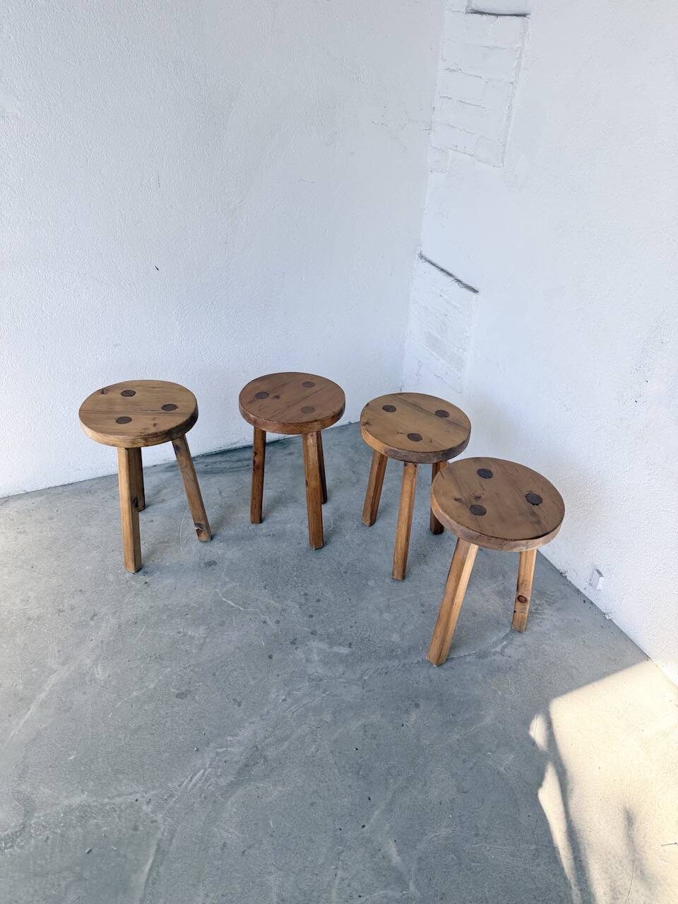 Set of 4 tripod stools from the 1950s.