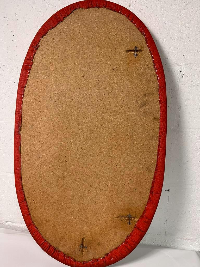Vintage oval orange mirror seventies 46 X 80 cm