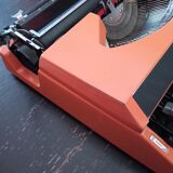 Machine à écrire orange vintage 1970
