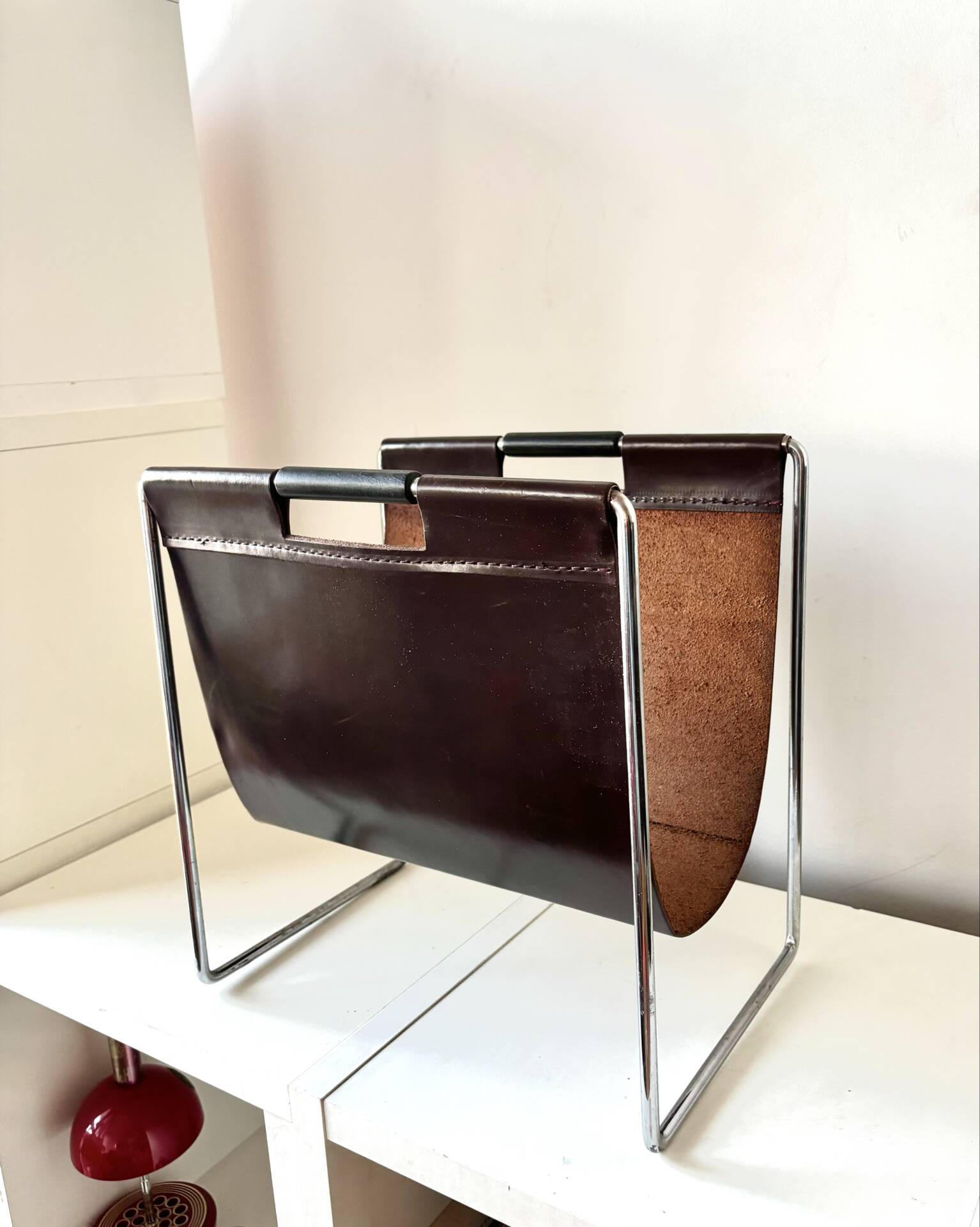 Leather and chrome magazine rack Brabantia