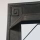 Hand-forged spiral decorative fire surround.