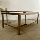 Coffee table in brass and smoked glass designed by Guy Lefèvre for the Jansen house, 1970s/80s