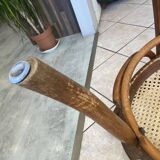 Bistro chair with a curved wooden frame and caned seat from the 1930s.