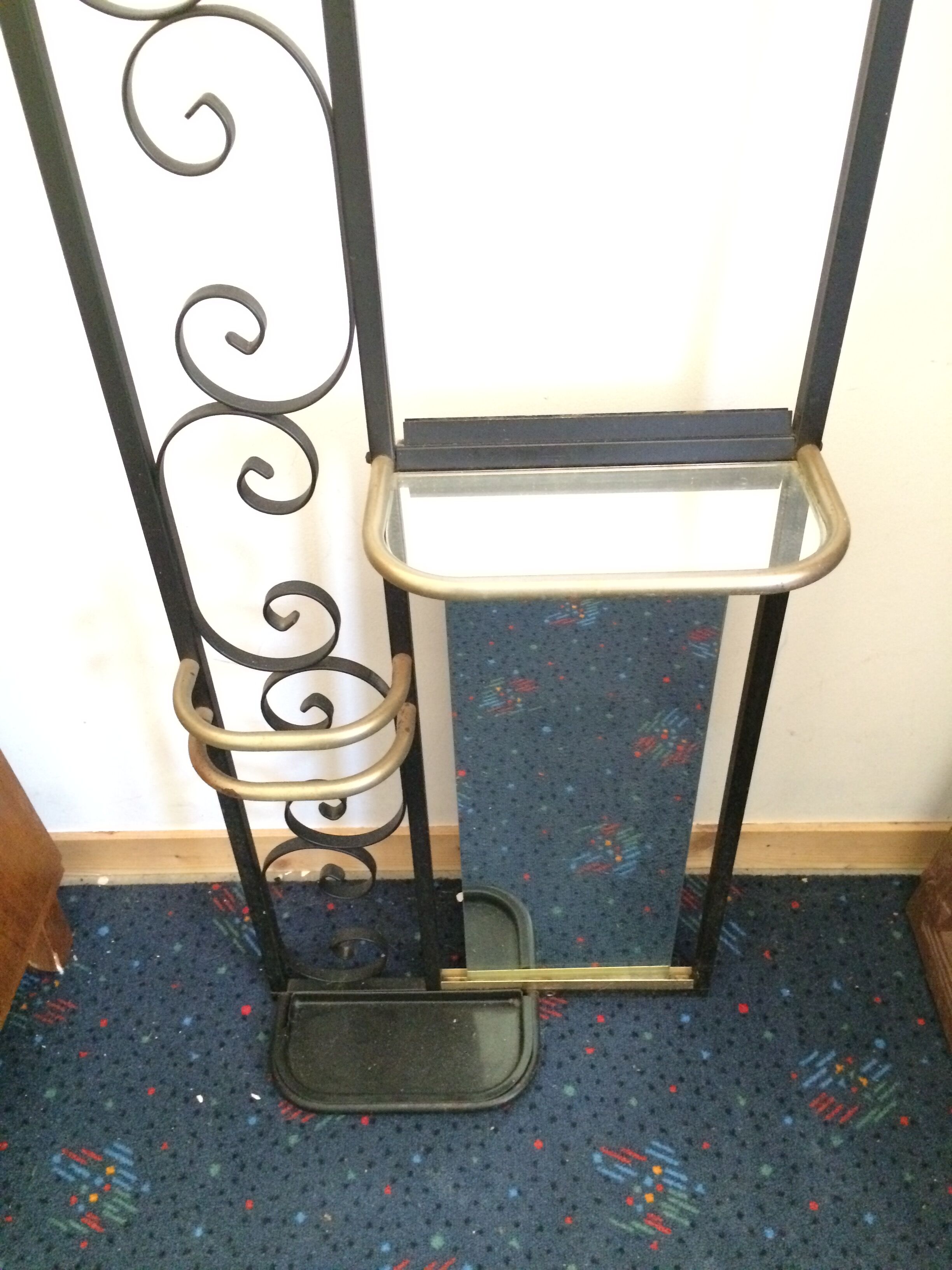 Coat hanger on wrought iron feet