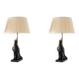Pair of Horus model table lamps, patinated bronze.