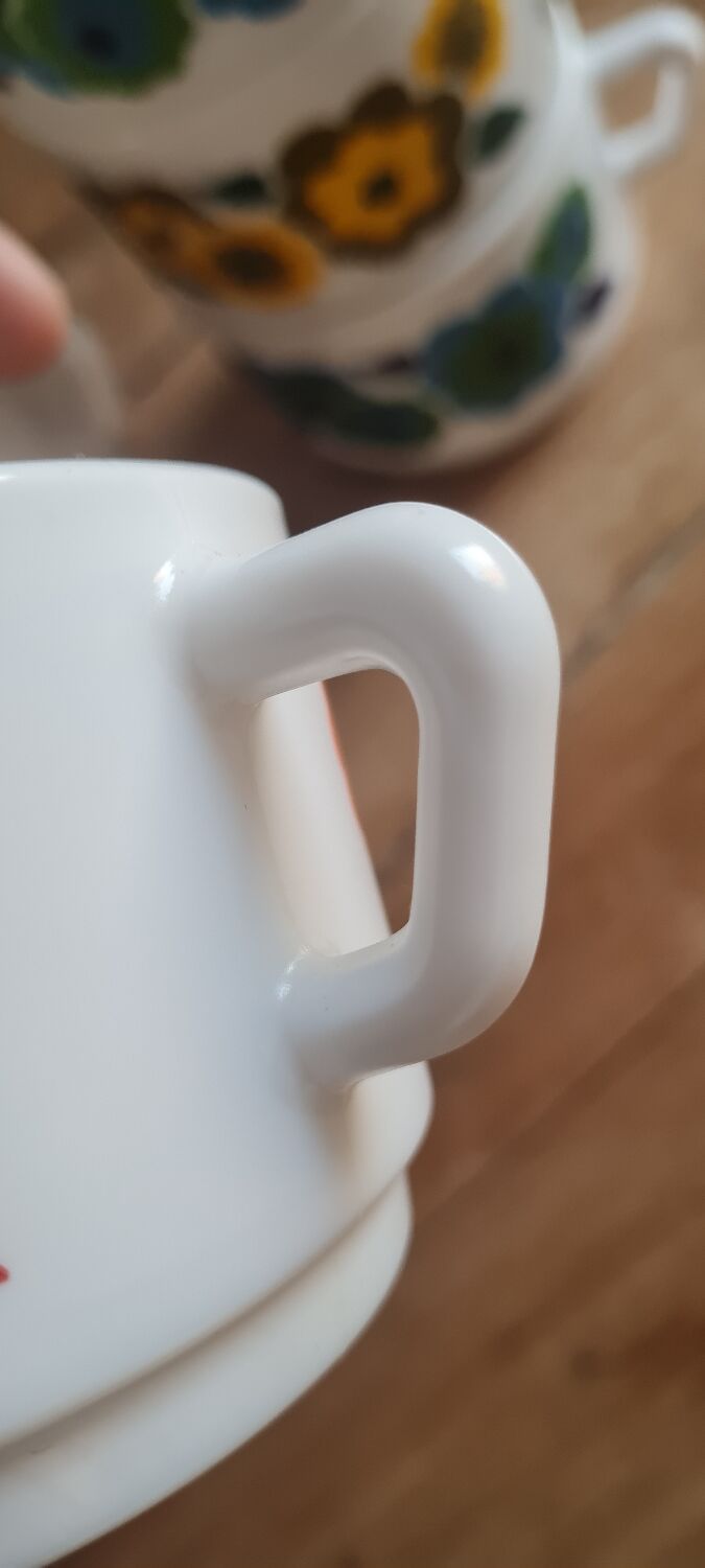 Set of seven arcopal coffee cups