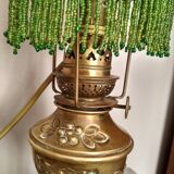 Brass lamp "La Parisienne" at the end of the 19th century.