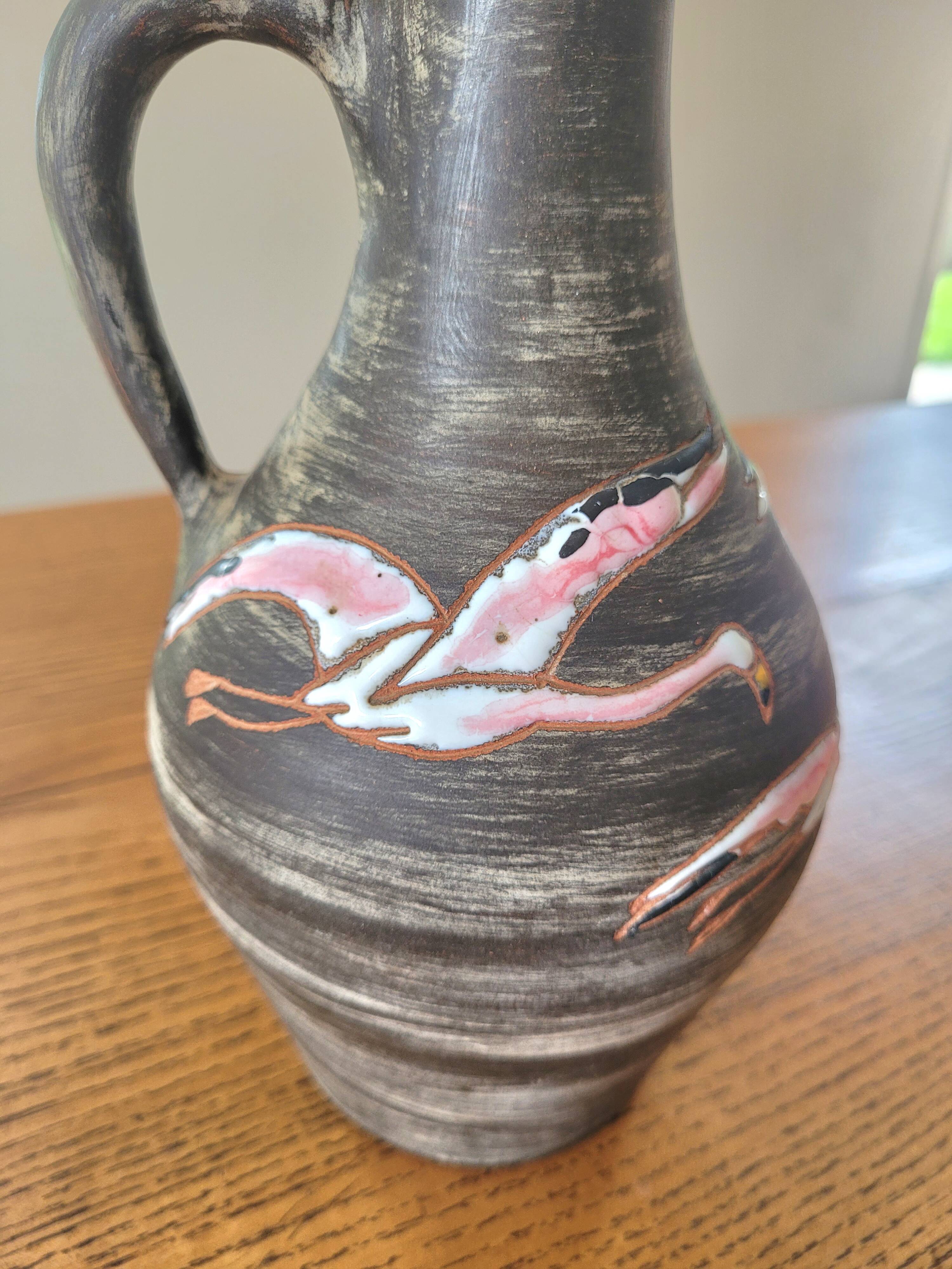 Rare signed ceramic and enameled porcelain pitcher