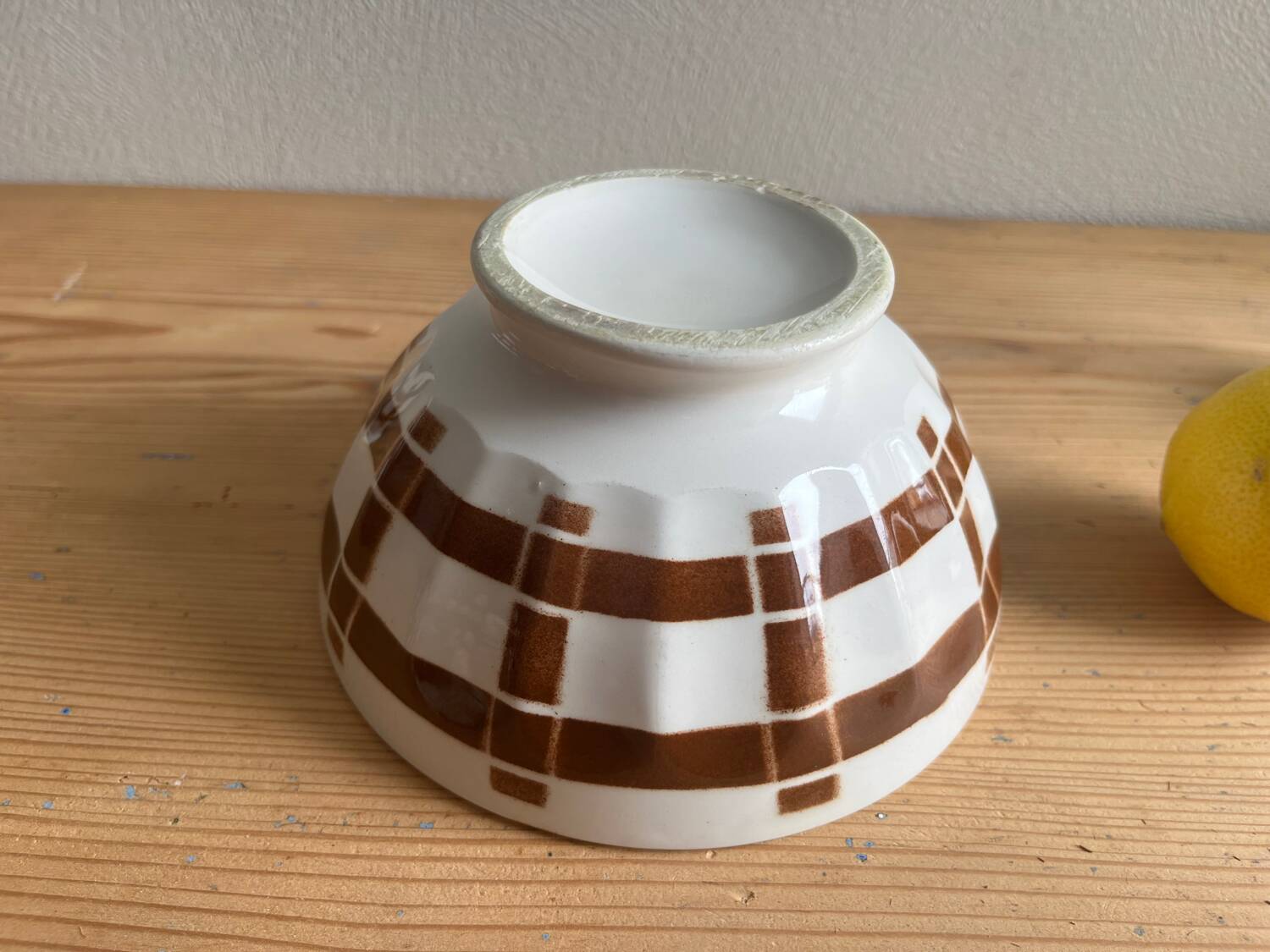 Antique faceted bowl on earthenware pedestal