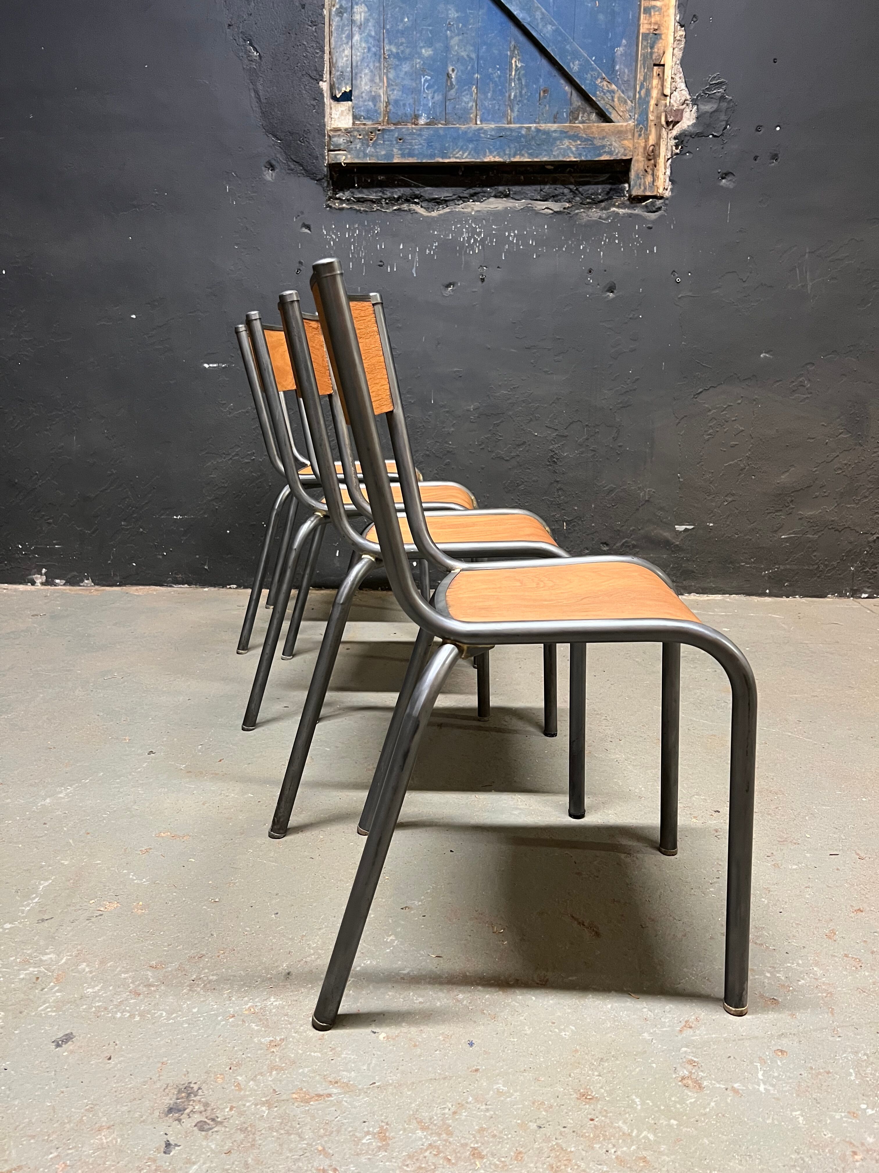 Set of Mulca school chairs patinated graphite.